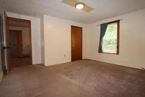 Bedroom - 95-97 Lancaster Rd, Gorham, NH 03581 photo 2 of 10