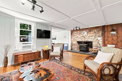 Living - 13 Harvey Rd, Sutton, NH 03260 photo 1 of 4