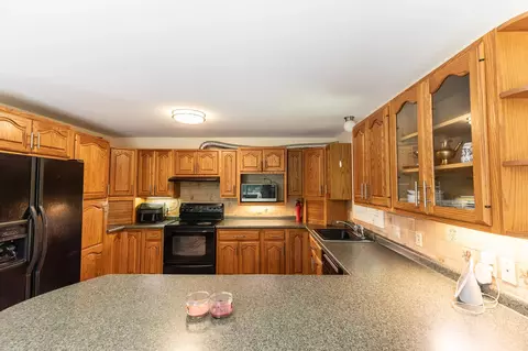 Kitchen - 150 Merrimack St, Hooksett, NH 03106 photo 6 of 7