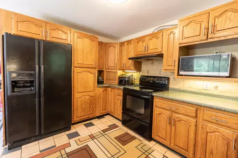 Kitchen - 150 Merrimack St, Hooksett, NH 03106 photo 2 of 7