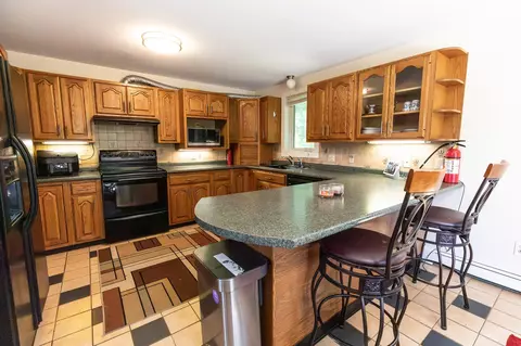 Kitchen - 150 Merrimack St, Hooksett, NH 03106 photo 1 of 7