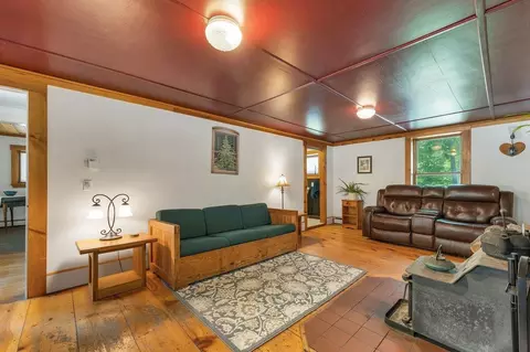 Living - 22 E Madison Rd, Madison, NH 03849 photo 1 of 4