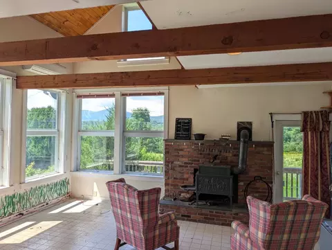 Living - 107 Bacon Rd, Jay, VT 05859 photo 2 of 2
