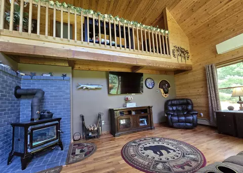 Living - 5391 Loop Rd, Troy, VT 05868 photo 2 of 2