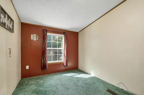 Bedroom - 131 Upper Oxbow Rd, New Hampton, NH 03256 photo 5 of 12