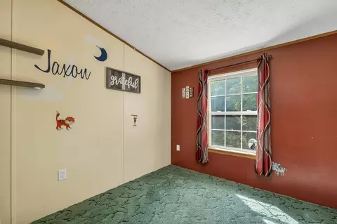 Bedroom - 131 Upper Oxbow Rd, New Hampton, NH 03256 photo 6 of 12