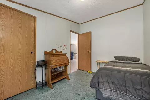 Bedroom - 131 Upper Oxbow Rd, New Hampton, NH 03256 photo 11 of 12