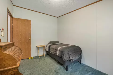 Bedroom - 131 Upper Oxbow Rd, New Hampton, NH 03256 photo 10 of 12