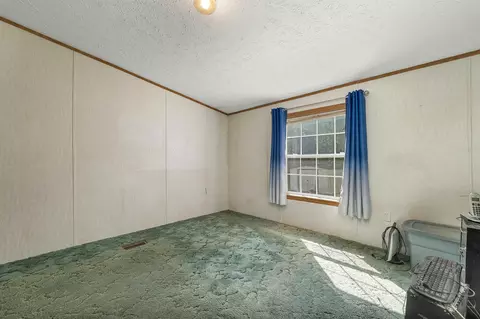 Bedroom - 131 Upper Oxbow Rd, New Hampton, NH 03256 photo 1 of 12