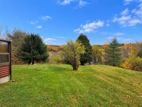 Exterior - 83 Bailey Ln, Glover, VT 05822 photo 8 of 12