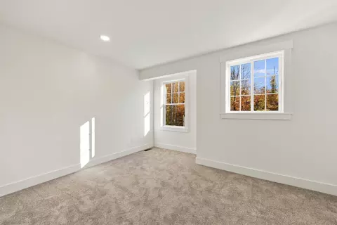 Bedroom - 21 Upper Ladd Hill Rd #E, Meredith, NH 03253 photo 8 of 9