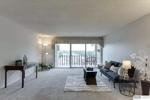 Living - 3003 Paddock Rd #413, Omaha, NE 68124 photo 2 of 7