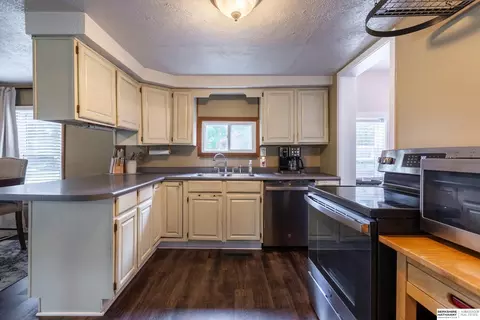 Kitchen - 605 2nd St, Waterloo, NE 68069 photo 2 of 4
