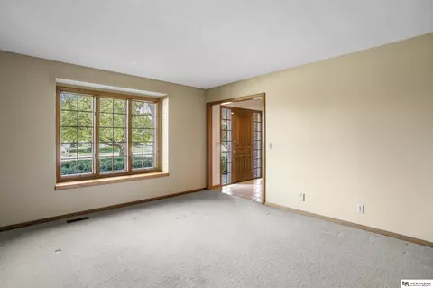 Living - 12941 Eagle Run Dr, Omaha, NE 68164 photo 7 of 10