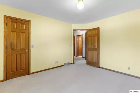 Bedroom - 12941 Eagle Run Dr, Omaha, NE 68164 photo 4 of 11