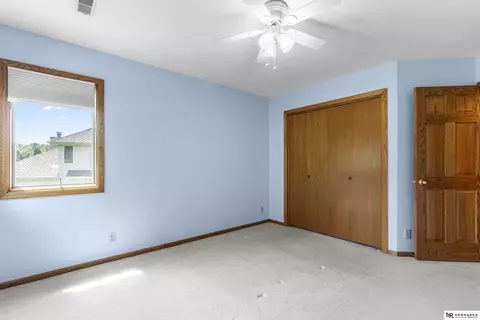 Bedroom - 12941 Eagle Run Dr, Omaha, NE 68164 photo 9 of 11