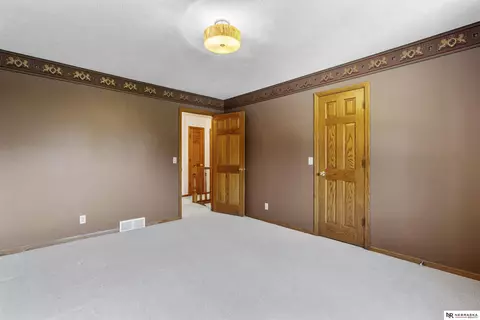 Bedroom - 12941 Eagle Run Dr, Omaha, NE 68164 photo 7 of 11