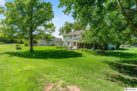 Exterior - 12941 Eagle Run Dr, Omaha, NE 68164 photo 8 of 11