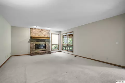Living - 12941 Eagle Run Dr, Omaha, NE 68164 photo 3 of 10