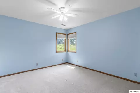 Bedroom - 12941 Eagle Run Dr, Omaha, NE 68164 photo 8 of 11