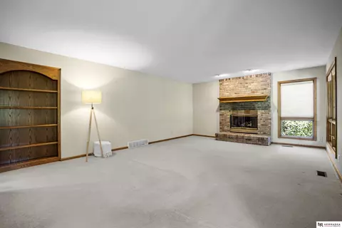 Living - 12941 Eagle Run Dr, Omaha, NE 68164 photo 2 of 10