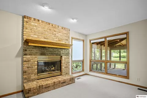 Living - 12941 Eagle Run Dr, Omaha, NE 68164 photo 4 of 10