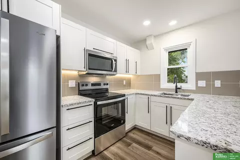 Kitchen - 9612 Maple St, Omaha, NE 68134 photo 1 of 2
