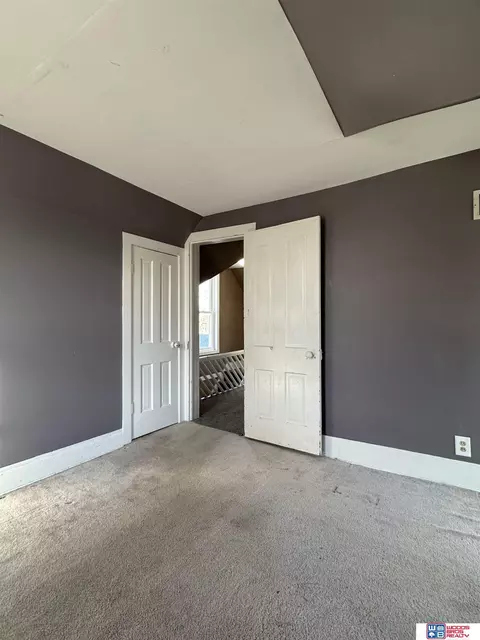Bedroom - 107 E 7th St, Stromsburg, NE 68666 photo 1 of 4