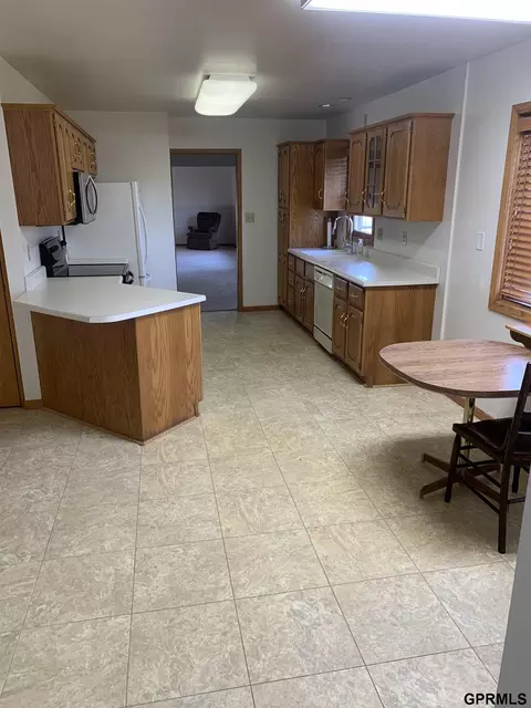 Kitchen - 155 N 5 St, Lyons, NE 68038 photo 3 of 5