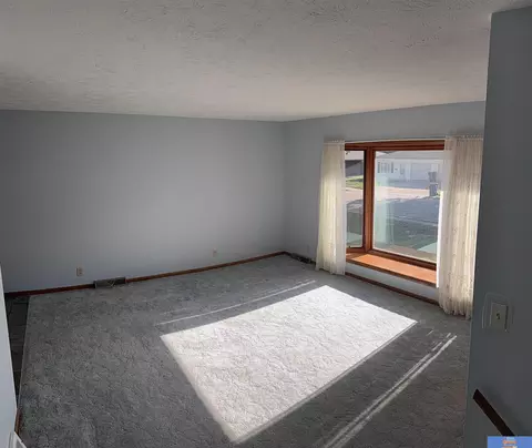 Living - 1005 N 16th Ave, Beatrice, NE 68310 photo 1 of 7