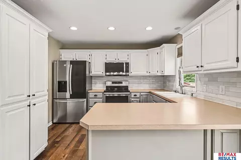 Kitchen - 604 2nd St, Waterloo, NE 68069 photo 2 of 4