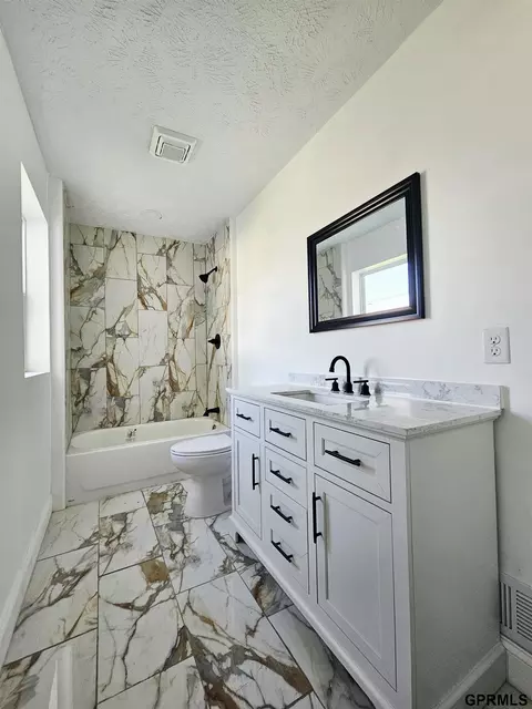 Bath - 111 E Hickory St, Sutton, NE 68979 photo 3 of 3