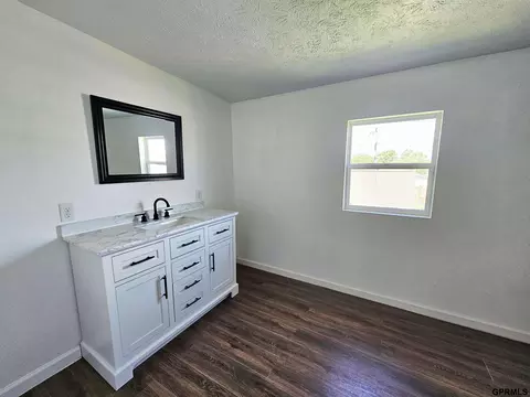 Bath - 111 E Hickory St, Sutton, NE 68979 photo 1 of 3