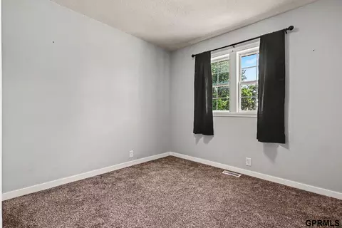 Bedroom - 1000 N 4th St, Springfield, NE 68059 photo 4 of 4