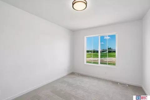 Bedroom - 9101 Castle Pine Dr, Lincoln, NE 68516 photo 3 of 10