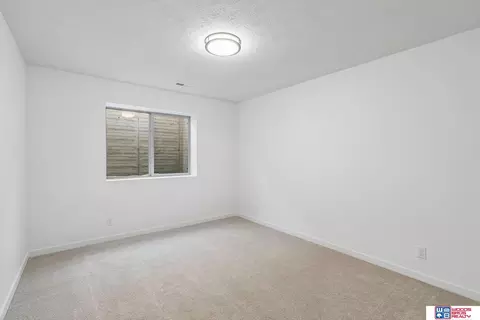 Bedroom - 9101 Castle Pine Dr, Lincoln, NE 68516 photo 7 of 10