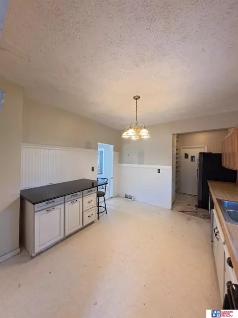 Kitchen - 401 E 7th St, Stromsburg, NE 68666 photo 2 of 4