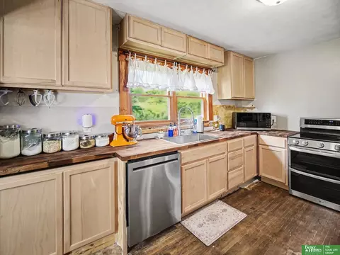 Kitchen - 5042 E Sargent Rd, Beatrice, NE 68310 photo 1 of 2