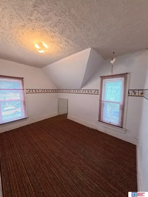 Bedroom - 211 E 8th St, Stromsburg, NE 68666 photo 2 of 7
