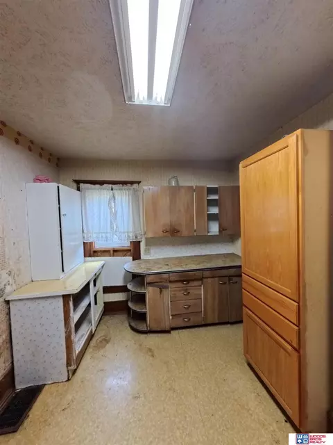 Kitchen - 211 E 8th St, Stromsburg, NE 68666 photo 1 of 2