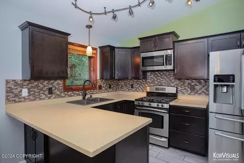Kitchen - 19730 S Montague Loop, Eagle River, AK 99577 photo 2 of 3