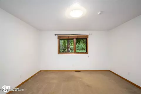 Bedroom - 18843 Mountain Rd, Chugiak, AK 99567 photo 5 of 13