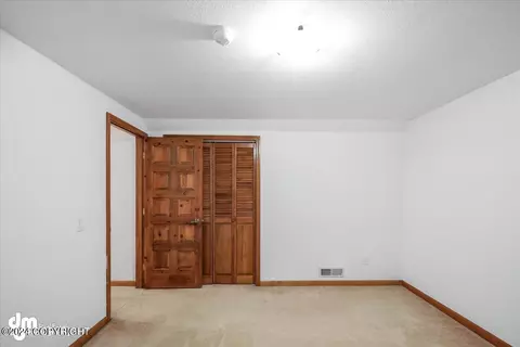 Bedroom - 18843 Mountain Rd, Chugiak, AK 99567 photo 8 of 13