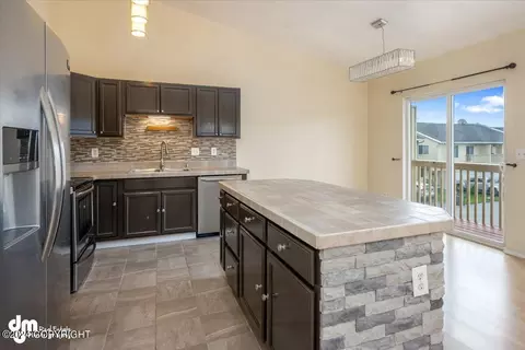 Kitchen - 4888 Barrington Loop # 27, Anchorage, AK 99503 photo 3 of 4