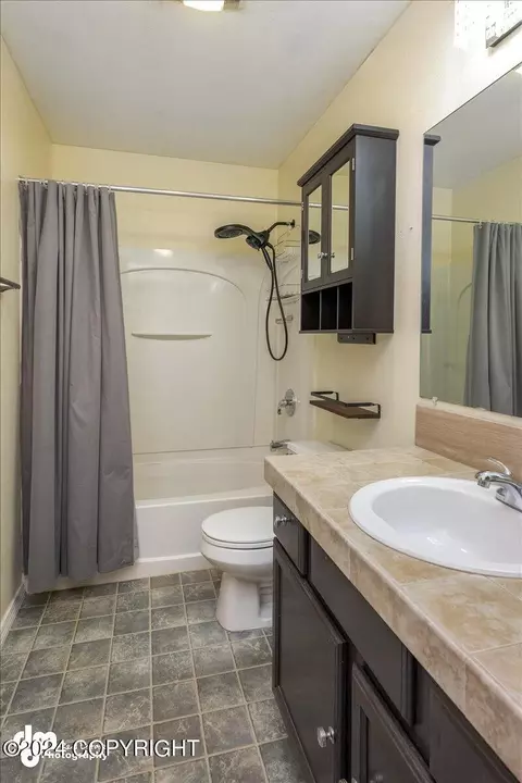 Bath - 4888 Barrington Loop # 27, Anchorage, AK 99503 photo 1 of 2