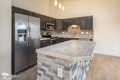 Kitchen - 4888 Barrington Loop # 27, Anchorage, AK 99503 photo 2 of 4
