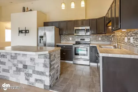 Kitchen - 4888 Barrington Loop # 27, Anchorage, AK 99503 photo 1 of 4