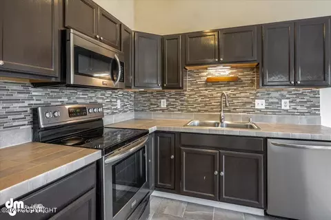 Kitchen - 4888 Barrington Loop # 27, Anchorage, AK 99503 photo 4 of 4