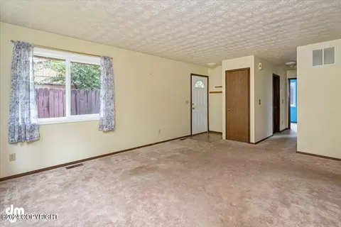 Living - 1829 Bellevue Loop, Anchorage, AK 99515 photo 3 of 4
