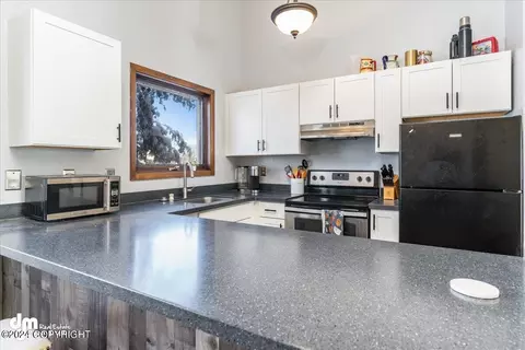 Kitchen - 3581 E 20th Ave, Anchorage, AK 99508 photo 3 of 6